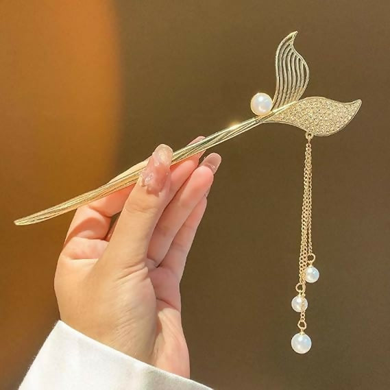 Vintage gold metal hair stick with a mermaid tail charm and hanging pearl tassel