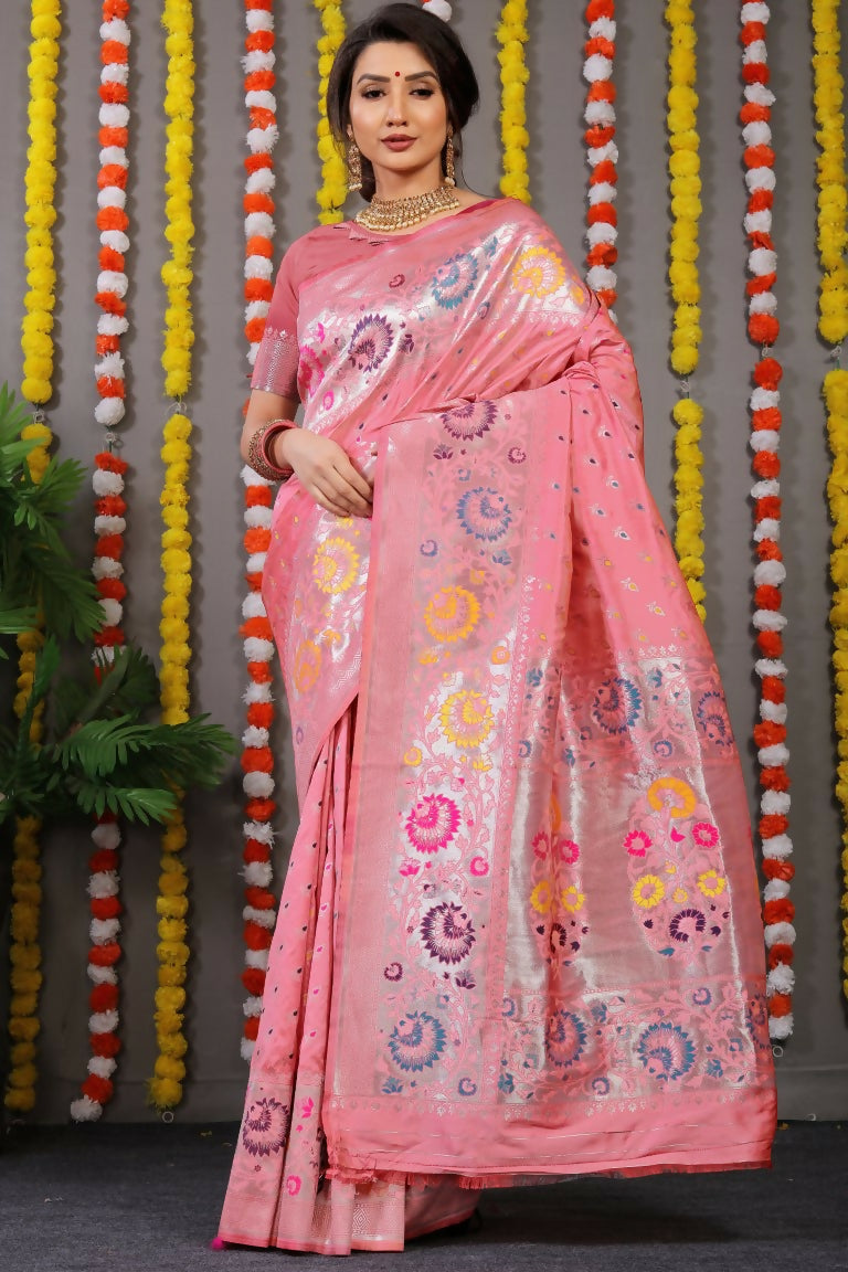 Baby pink Banarasi silk saree with intricate gold zari woven border and matching blouse piece.