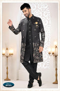 Men's black 3-piece kurta set with intricate silk thread and sequence embroidery detailing.