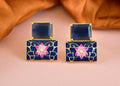 Elegant women's blue onyx-colored earrings made from brass with a polished finish