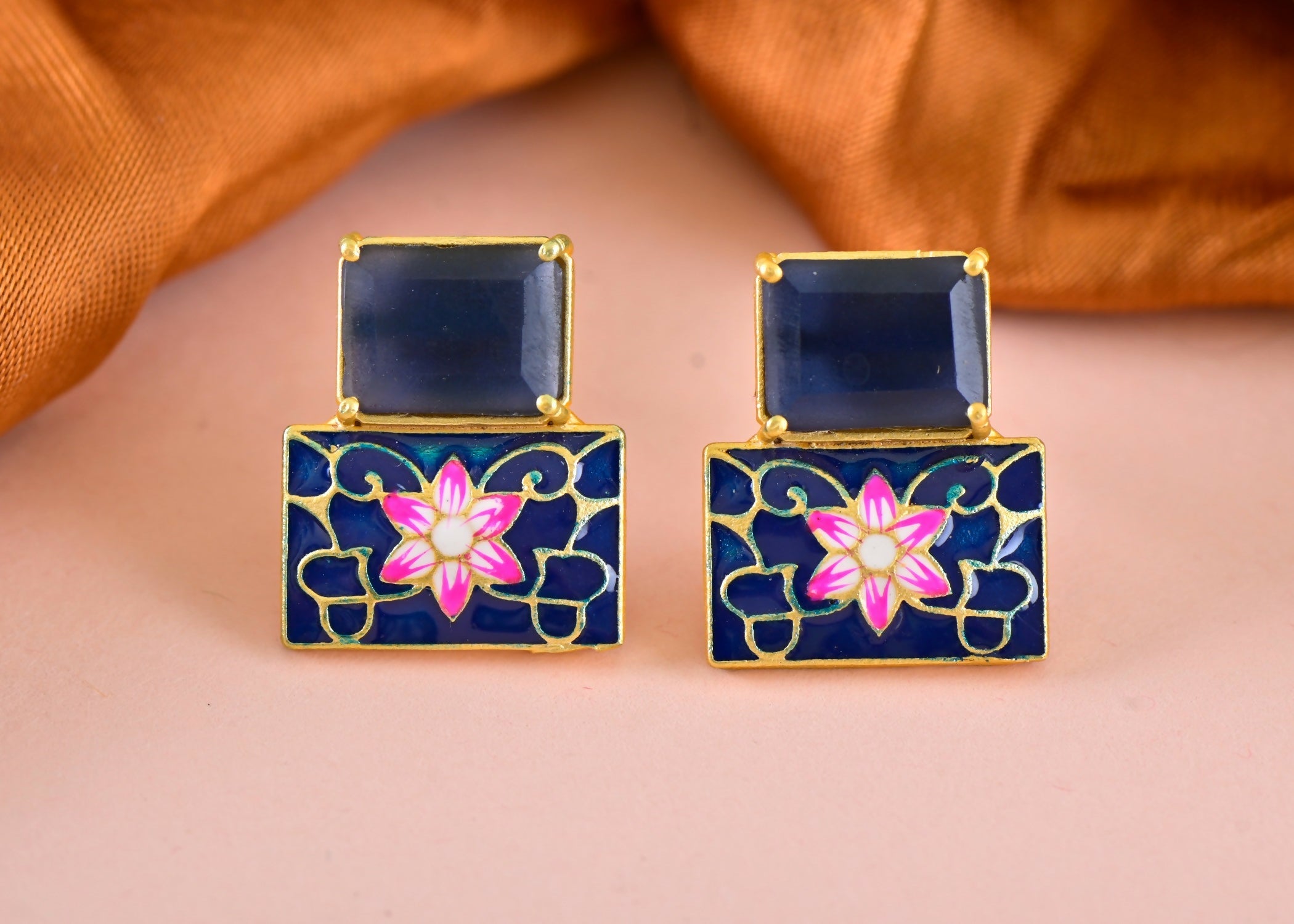 Elegant women's blue onyx-colored earrings made from brass with a polished finish