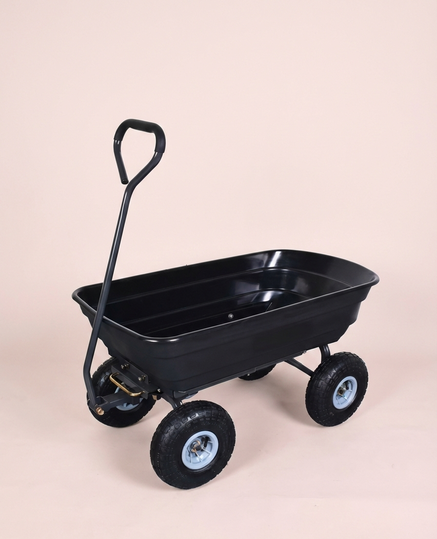 Heavy duty black and grey garden dump cart with 10-inch pneumatic tires on a grass surface