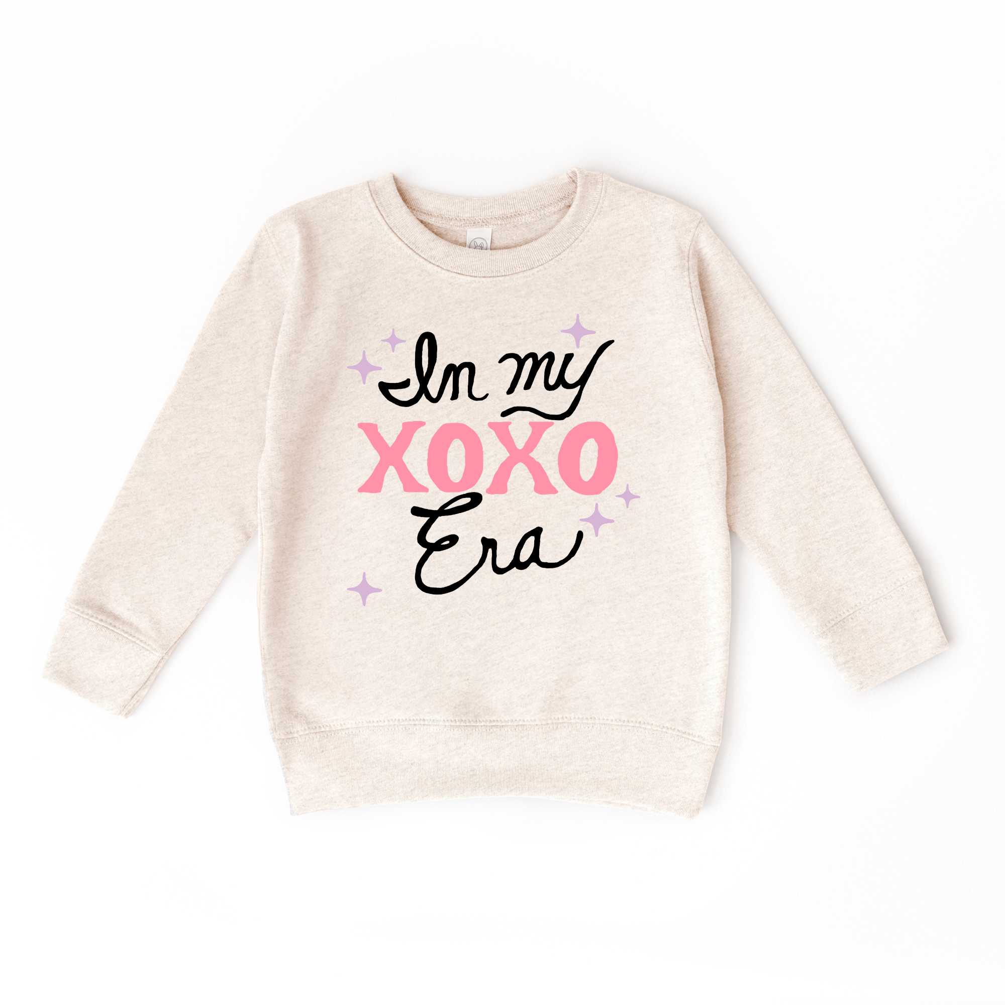 In my XOXO Era Sweater
