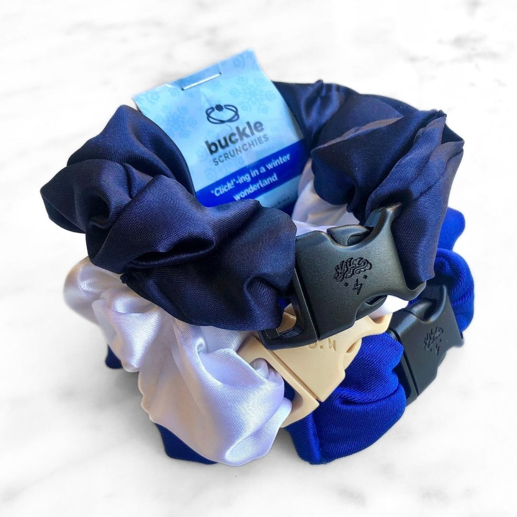 3-pack of Winter Wonderland holiday hair scrunchies in shades of blue and white.
