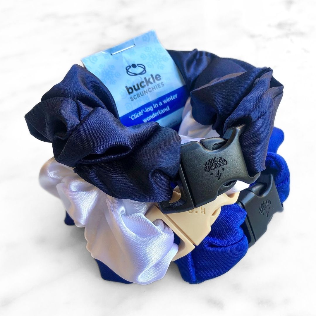 3-pack of Winter Wonderland holiday hair scrunchies in shades of blue and white.