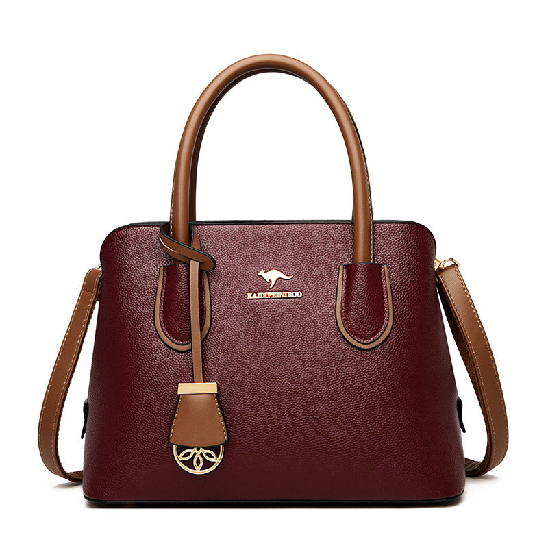 Spacious Leather Diaper Tote Bag with Crossbody Strap for Parents