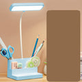 Smart LED desk lamp with integrated pen holder on a modern clean desk