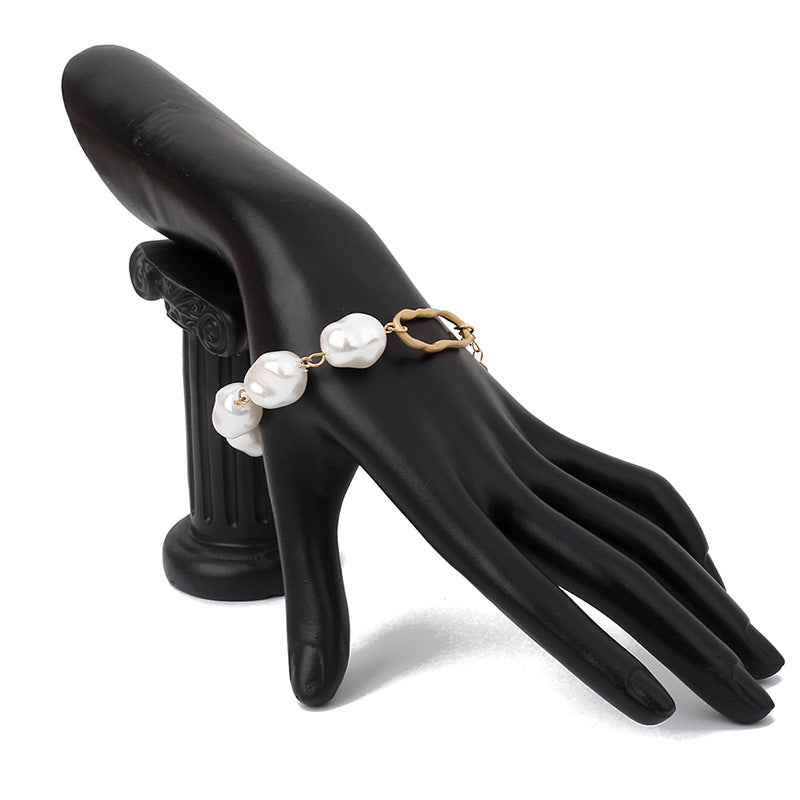 Four-Row Pearl Link Chain Bracelet in Gold-Tone Metal