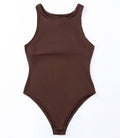 Close up of a model wearing a Seamless Crew Neck Bodysuit in Brown