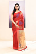 Maroon cotton blend Jamdani saree featuring a detailed temple border and delicate embellishments.