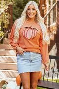 Women's orange Halloween sweatshirt featuring a glittery sequined pumpkin design