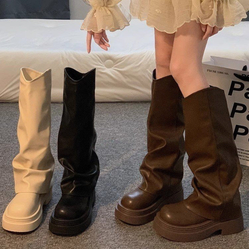 Three pairs of stylish women’s platform boots in black, beige, and brown, featuring a modern British-inspired slouchy design.