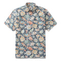 Men wearing a short-sleeve button-down Hawaiian shirt with a colorful fish and coral print against a light background.