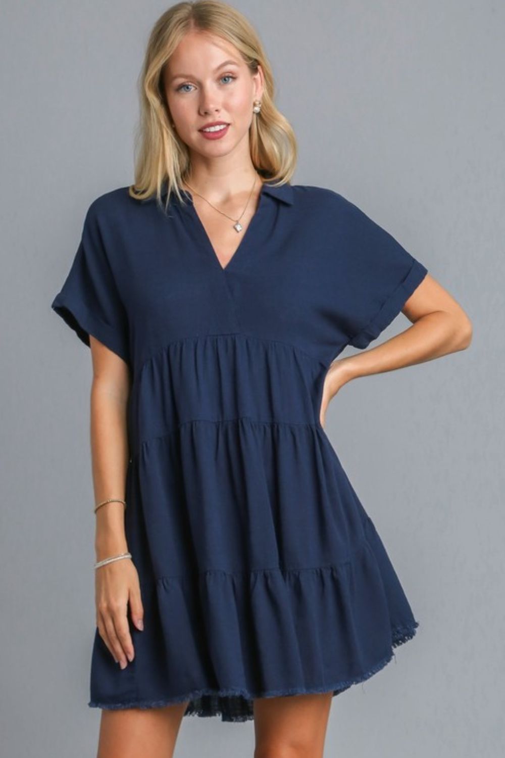 Dark navy casual tiered dress with raw hem and folded sleeves