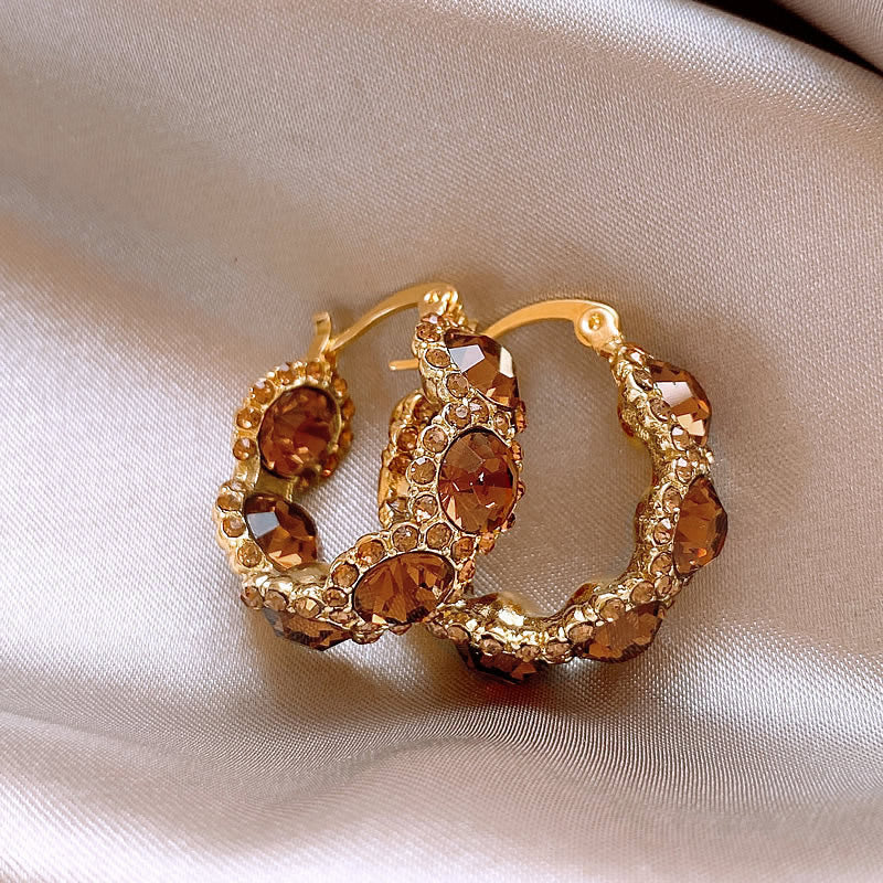 Elegant coffee-colored crystal hoop ear clips with a U-shaped design