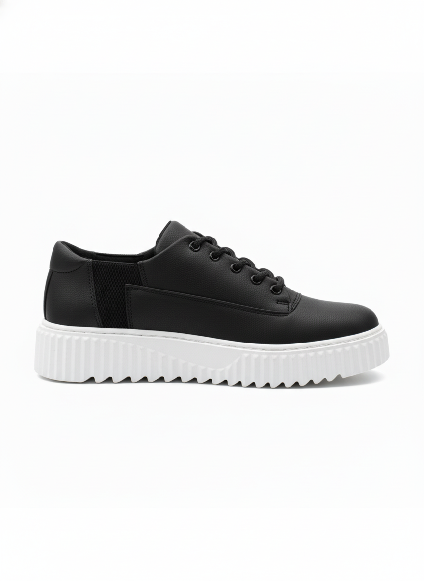 A pair of sleek black men's sneakers with a thick, ridged white platform sole, shown from the side against a white background.