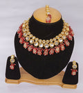 Red Kundan work necklace set with gold plating and adjustable cord