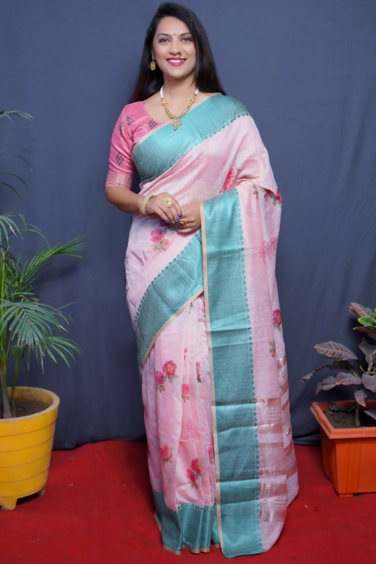Teal linen silk saree with digital prints and decorative jacquard border