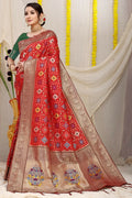 Red Patola silk saree with Zari woven design and contrast green blouse piece