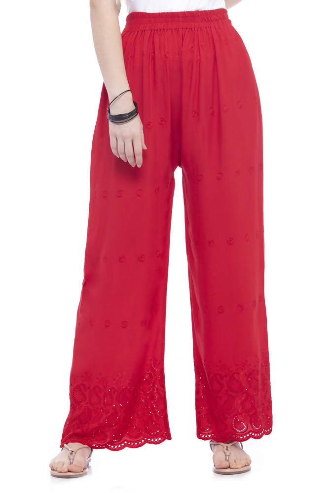 Close up of red rayon cotton palazzo pants featuring intricate Chikan embroidery.