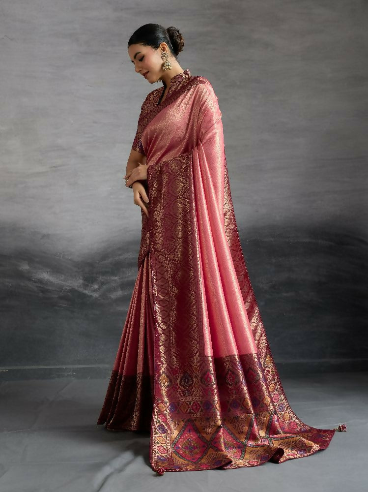 Peach Kanjivaram soft silk saree featuring Kadiyal pattern and Meenakari pallu