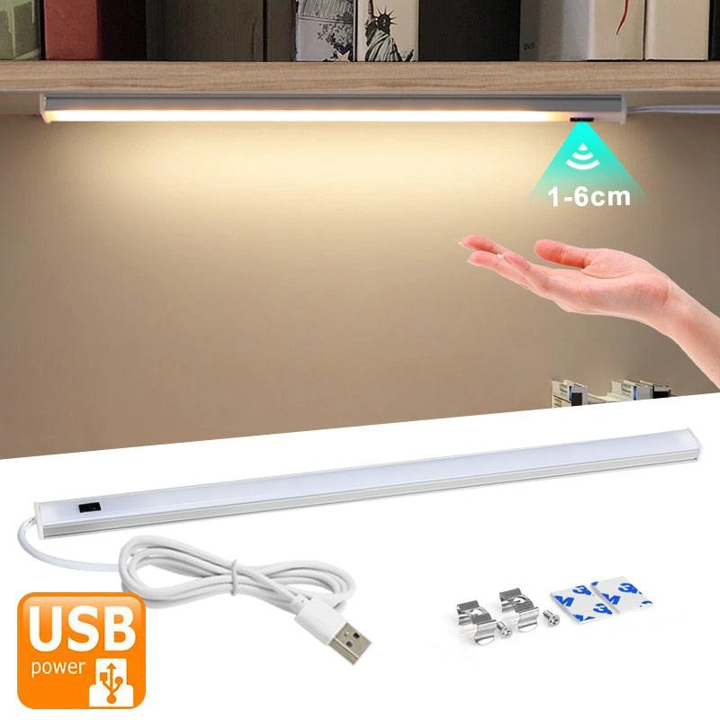 Stevvex motion sensor LED desk lamp in a modern bedroom setting
