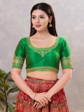 Vibrant green silk stitched blouse with round neck for ethnic sarees