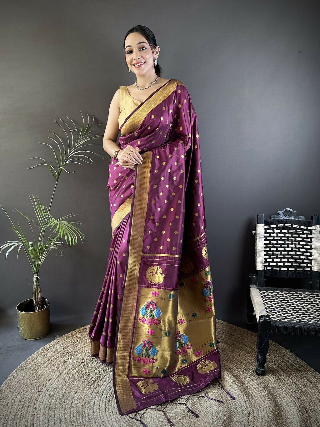 Wine colored Lichi silk Paithani saree with polka dot patterns and matching blouse.