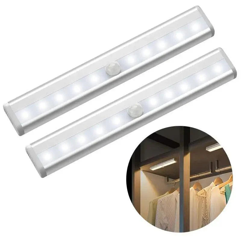 Silver aluminum motion sensor LED light installed under a kitchen cabinet