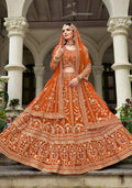 Monjolika Fashion Orange Butterfly Net Embroidered Work Stunning Lehenga For Wedding Season