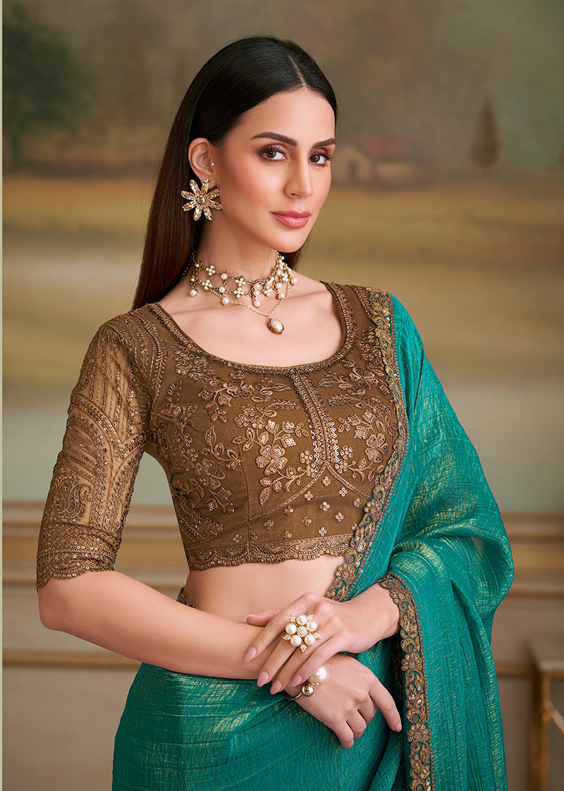 Sea Green Gold Georgette Saree with Embroidered Border