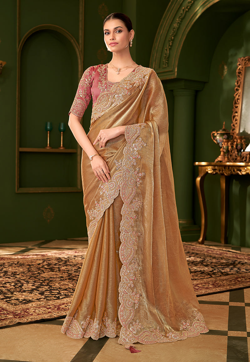 Gold Beige satin chiffon silk saree paired with a heavy embroidered designer blouse