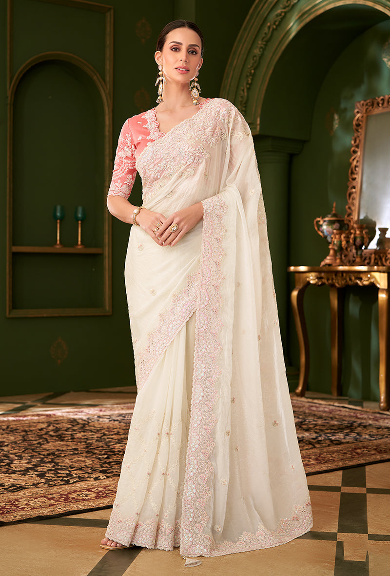 Elegant white satin georgette silk saree with intricate heavy work blouse