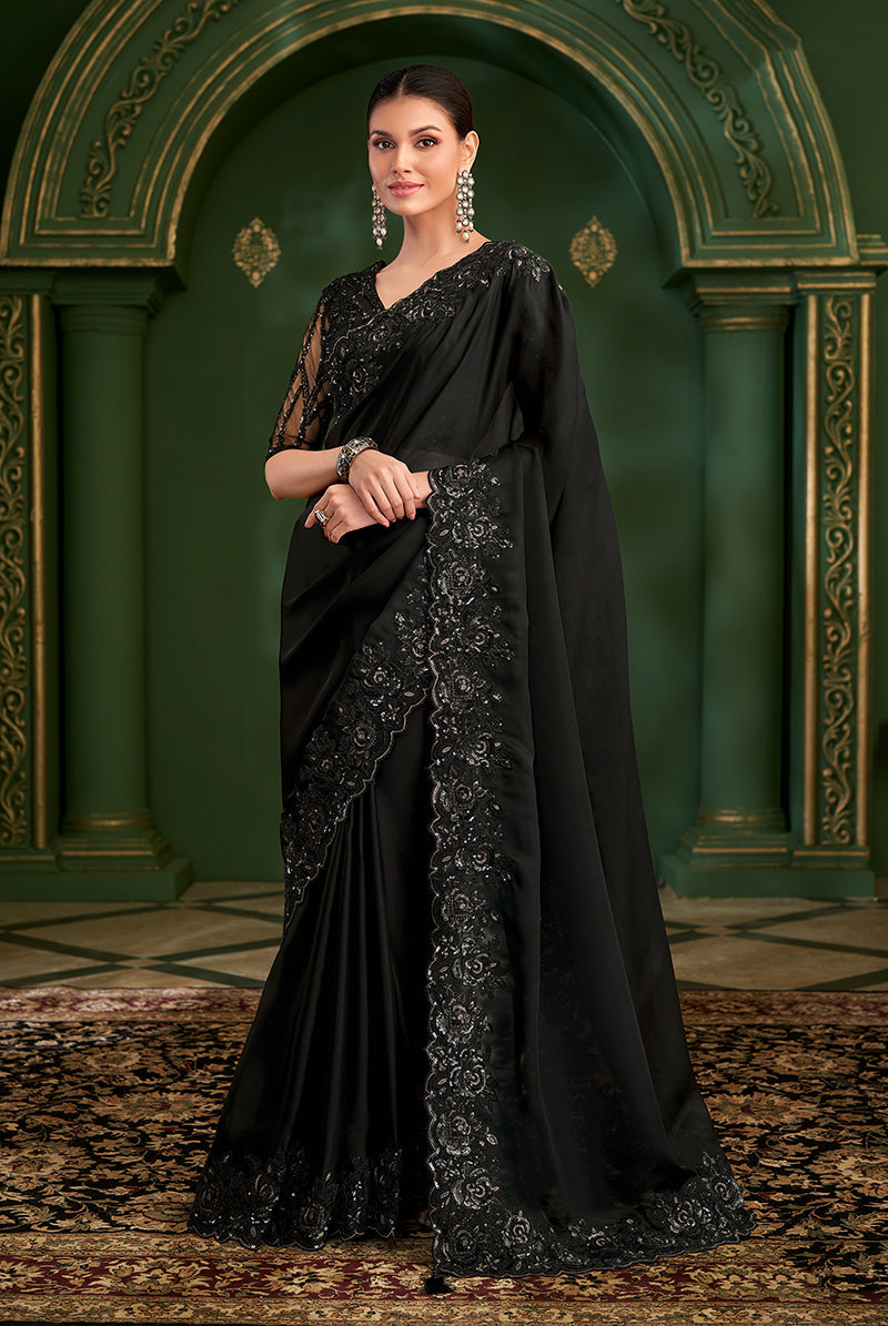 Black satin georgette saree with heavy embroidered khatli and sequins work blouse