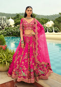 Rani Pink silk lehenga choli with heavy embroidery for festive wear