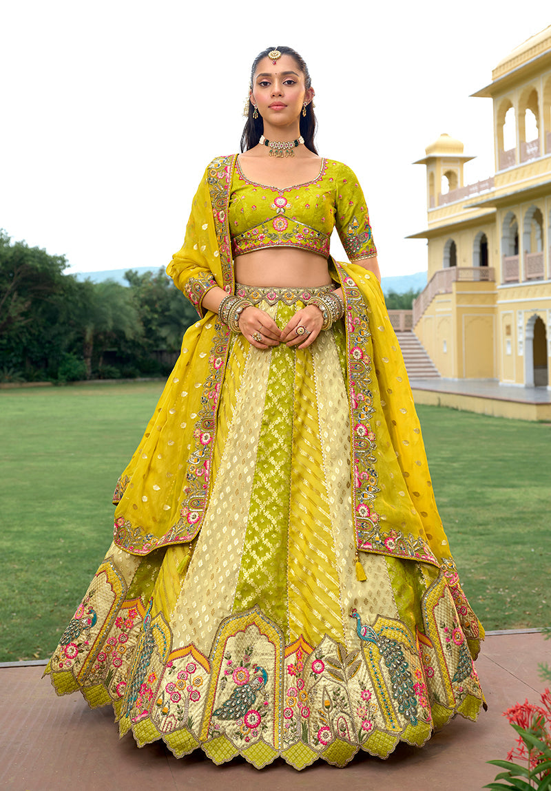 Parrot green and multicolor designer silk lehenga choli with intricate embroidery for weddings