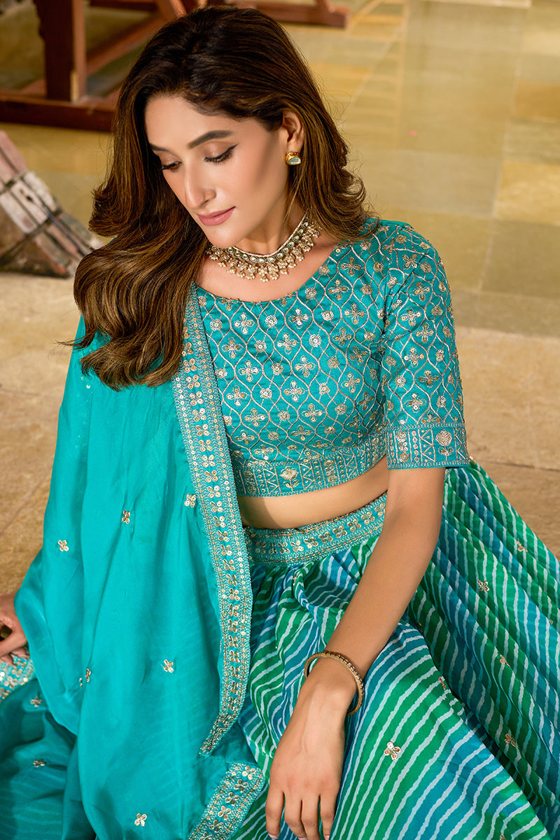 Turquoise Leheriya Print Faux Georgette Embroidered Lehenga Choli