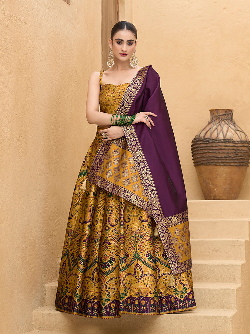 Yellow Kanjivaram silk lehenga choli with zari embroidery and dupatta