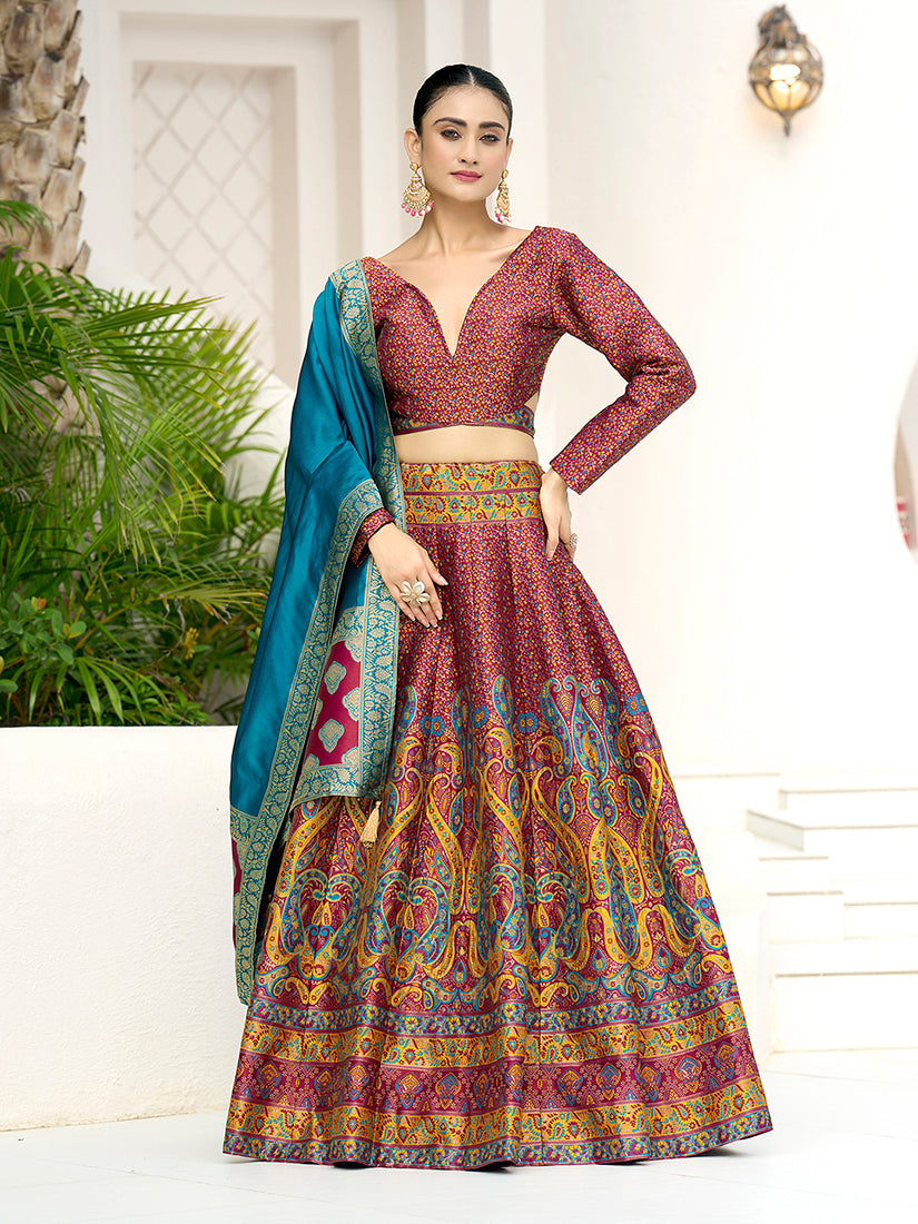 Model wearing a red Kanjivaram jacquard lehenga choli for a ceremonial event