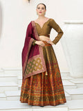 Elegant Olive Kanjivaram Jacquard Lehenga Choli with intricate patterns for ceremonial wear.