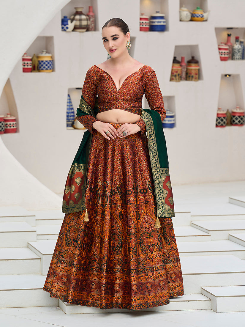 Elegant rust color Kanjivaram jacquard lehenga choli with intricate traditional patterns