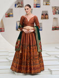Elegant rust color Kanjivaram jacquard lehenga choli with intricate traditional patterns
