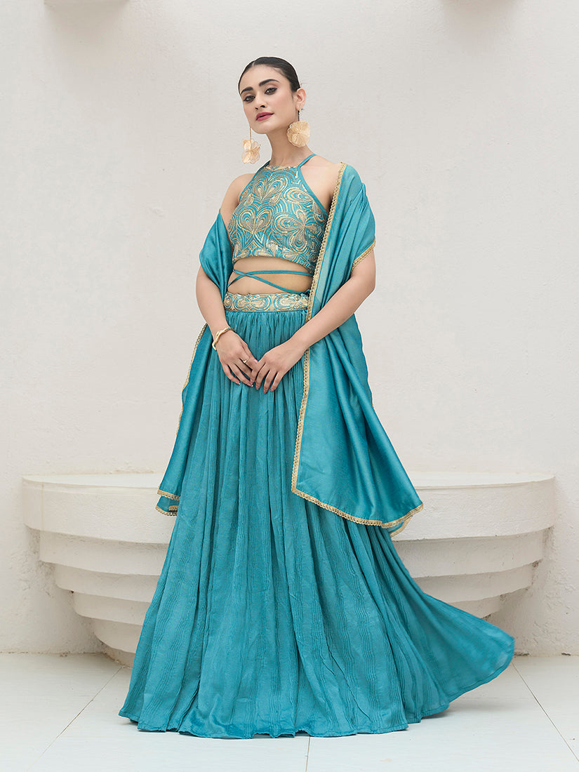 Sky blue silk crush lehenga choli with a pleated design for festive occasions.
