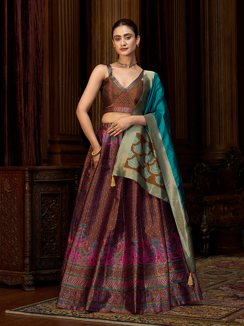 A brown Kanjivaram silk lehenga choli with intricate jacquard weaving and gold zari work.
