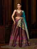 A brown Kanjivaram silk lehenga choli with intricate jacquard weaving and gold zari work.