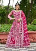 Vibrant rani pink net Anarkali gown featuring detailed embroidery