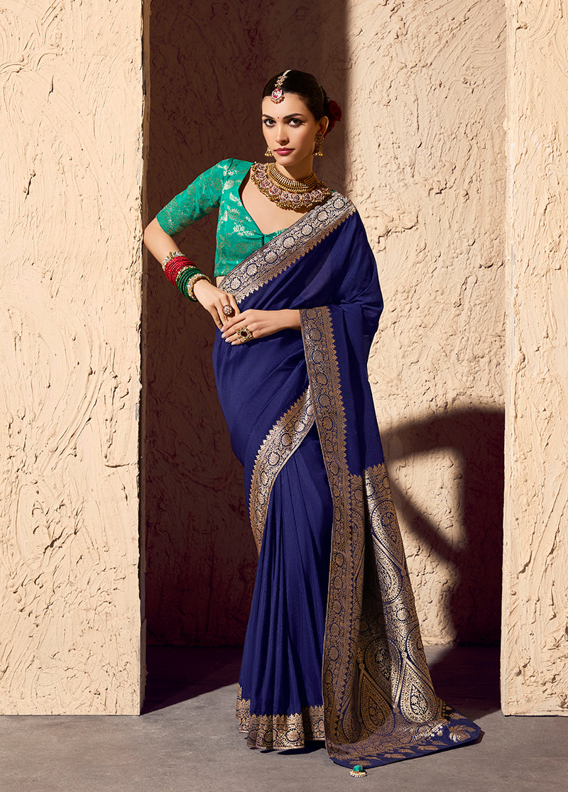 Navy blue saree in crepe georgette fabric featuring intricate zari weaving