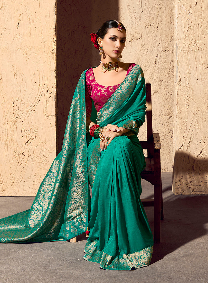Teal Crepe Georgette Saree with Elegant Zari Weaving Work