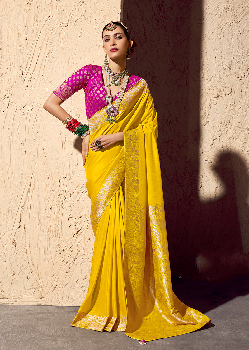 Yellow crepe georgette saree with intricate gold zari weaving work