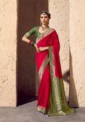 Classic red crepe georgette saree featuring intricate gold zari weaving work
